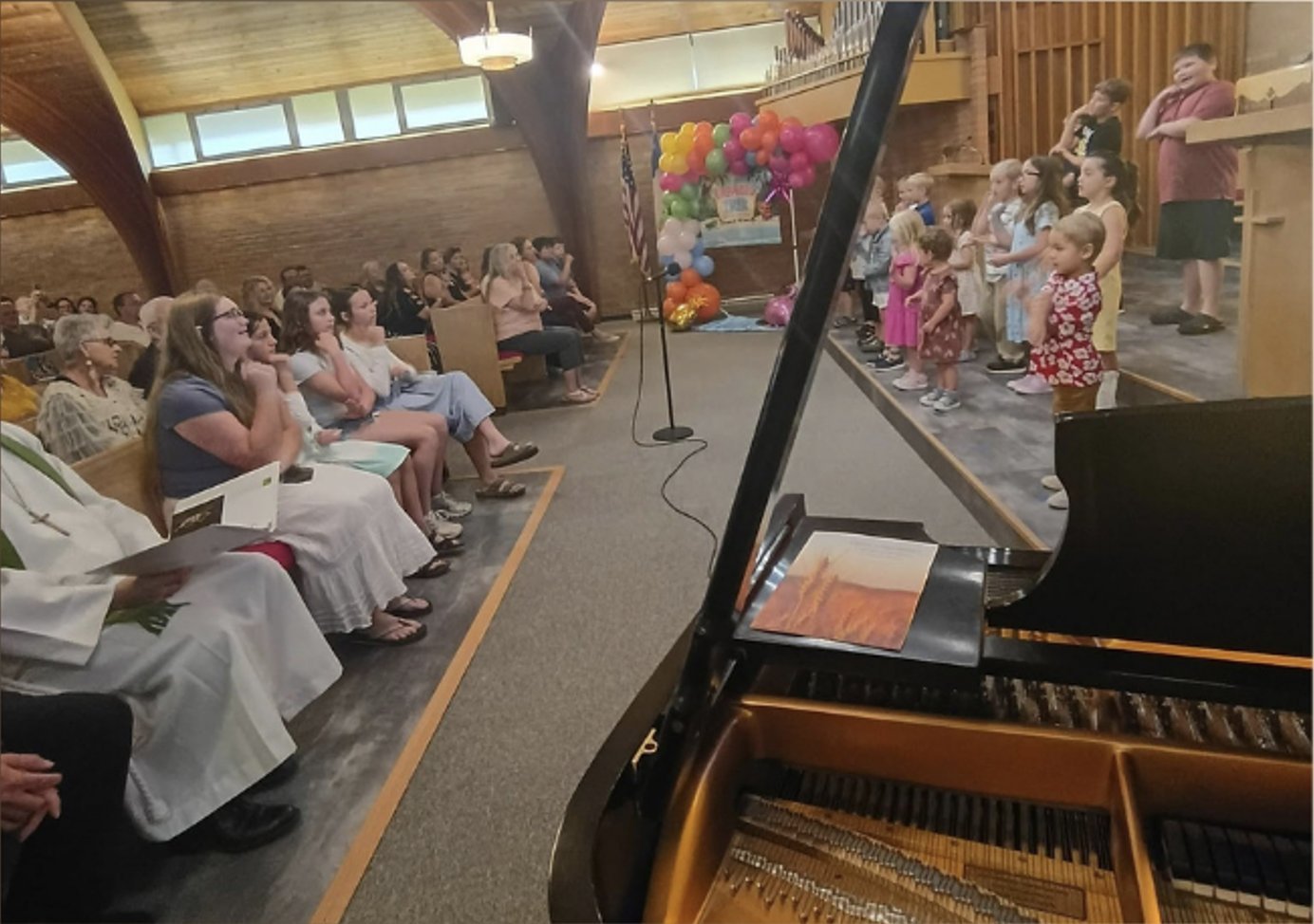 Children participating in worship at Trinity Auburn