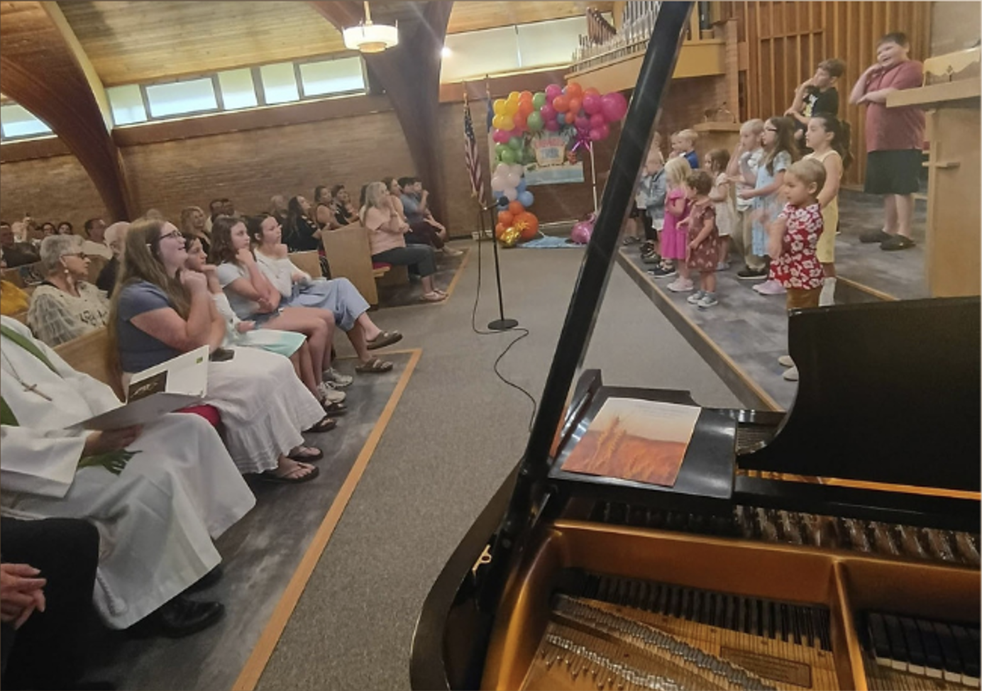 Children participating in worship at Trinity Auburn